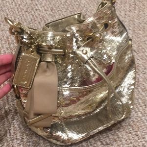 Coach gold sequins poppy bag. Excellent condition. No rips or stains.